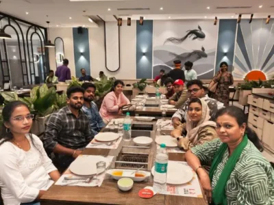 Mustang team members sharing a company dinner